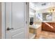 Bathroom with a glass shower, soaking tub, and double vanity at 4333 W Shaw Butte Dr, Glendale, AZ 85304