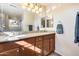 Primary bathroom with granite countertops and double sinks at 4333 W Shaw Butte Dr, Glendale, AZ 85304