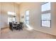 Spacious dining area with large windows and high ceilings at 4333 W Shaw Butte Dr, Glendale, AZ 85304