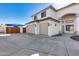 Two-car garage with modern finishes and a long driveway at 4333 W Shaw Butte Dr, Glendale, AZ 85304