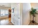 A hallway with tiled floors and a door to storage at 4333 W Shaw Butte Dr, Glendale, AZ 85304