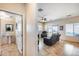 View of living room and powder room from hallway at 4333 W Shaw Butte Dr, Glendale, AZ 85304