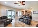 Living room with recliner and view into kitchen at 4333 W Shaw Butte Dr, Glendale, AZ 85304