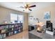 Home office with built-in shelving and large desk at 4333 W Shaw Butte Dr, Glendale, AZ 85304