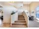 Elegant staircase leading to upper level at 4333 W Shaw Butte Dr, Glendale, AZ 85304