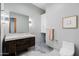 Modern bathroom with floating vanity and designer tile at 4602 E Arcadia Ln, Phoenix, AZ 85018