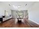 Bright dining room with hardwood floors and large windows at 4602 E Arcadia Ln, Phoenix, AZ 85018