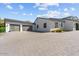 Two-car garage with modern wood and glass doors at 4602 E Arcadia Ln, Phoenix, AZ 85018