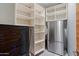 Well-organized pantry with shelving and a mini-fridge at 4602 E Arcadia Ln, Phoenix, AZ 85018