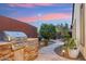 Outdoor kitchen with built-in grill and stonework at 4910 S Huachuca Pl, Chandler, AZ 85249