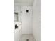 Large walk-in shower with white subway tile and penny tile floor at 4910 S Huachuca Pl, Chandler, AZ 85249