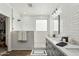 Spa-like bathroom with double vanity, walk-in shower, and gray cabinets at 4910 S Huachuca Pl, Chandler, AZ 85249