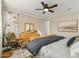 Relaxing bedroom features a large bed, wood dresser, and patterned wallpaper at 4910 S Huachuca Pl, Chandler, AZ 85249