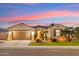 Front view of a single story home with landscaping at 4910 S Huachuca Pl, Chandler, AZ 85249