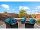 Peaceful patio with fire pit and comfortable seating at 4910 S Huachuca Pl, Chandler, AZ 85249