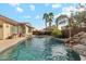 Stunning pool and spa with a relaxing waterfall feature at 4910 S Huachuca Pl, Chandler, AZ 85249