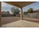 Covered patio overlooking a gravel backyard at 4933 E Meadow Mist Ln, San Tan Valley, AZ 85140