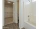 Bathroom features a tub, toilet and walk-in closet at 4933 E Meadow Mist Ln, San Tan Valley, AZ 85140