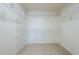 Large walk-in closet with wire shelving at 4933 E Meadow Mist Ln, San Tan Valley, AZ 85140