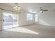 Living room with sliding door to backyard access at 4933 E Meadow Mist Ln, San Tan Valley, AZ 85140