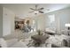 Open-concept living room and dining area, featuring lots of natural light and seamless flow at 4933 E Meadow Mist Ln, San Tan Valley, AZ 85140