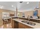 Modern kitchen with granite countertops and breakfast bar at 5138 N 78Th St, Scottsdale, AZ 85250