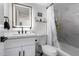 Modern bathroom with white cabinets and marble tile at 533 W Guadalupe Rd # 1069, Mesa, AZ 85210