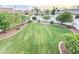 Expansive backyard with a large grassy area and mature trees at 5345 E Mclellan Rd # 98, Mesa, AZ 85205