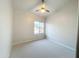 Well-lit bedroom with ceiling fan and window at 5345 E Mclellan Rd # 98, Mesa, AZ 85205