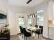 Elegant dining area with gold and black chairs and modern light fixture at 5345 E Mclellan Rd # 98, Mesa, AZ 85205