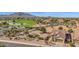 Aerial view of a house and golf course community at 6688 S Cartier Dr, Gilbert, AZ 85298