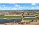 Aerial view of community amenities including clubhouse, pool, and golf course at 6688 S Cartier Dr, Gilbert, AZ 85298