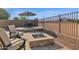 Cozy fire pit area with seating and mountain views at 6688 S Cartier Dr, Gilbert, AZ 85298