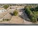 Aerial view of a house, lot, and horse stables at 6841 N 183Rd Ave, Waddell, AZ 85355