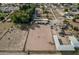 Aerial view of a large property with a house, barn, riding arena, and other buildings at 6841 N 183Rd Ave, Waddell, AZ 85355