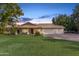 Single-story home with three-car garage and large front yard at 6841 N 183Rd Ave, Waddell, AZ 85355