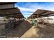 Covered horse stalls offering protection from the elements at 6841 N 183Rd Ave, Waddell, AZ 85355