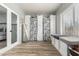 Large walk-in closet with built in shelving and window at 6841 N 183Rd Ave, Waddell, AZ 85355