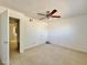 Bright bedroom with ceiling fan and carpet at 731 E Manor Dr, Casa Grande, AZ 85122