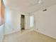 Well-lit bedroom with ceiling fan and closet at 731 E Manor Dr, Casa Grande, AZ 85122