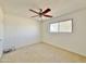 Bright bedroom with carpet flooring and ceiling fan at 731 E Manor Dr, Casa Grande, AZ 85122