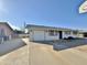 White single story home with a two-car garage at 731 E Manor Dr, Casa Grande, AZ 85122