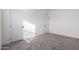 Spacious bedroom with neutral carpeting and ample closet space at 7710 S 350Th Ave, Tonopah, AZ 85354