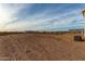 View of the backyard and neighboring homes at 7710 S 350Th Ave, Tonopah, AZ 85354