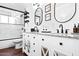 Modern bathroom with a double vanity and a walk-in shower at 7715 E Catalina Dr, Scottsdale, AZ 85251