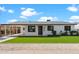 Charming single story home with a landscaped lawn and covered porch at 7715 E Catalina Dr, Scottsdale, AZ 85251