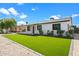 House exterior featuring a well-manicured lawn and modern design at 7715 E Catalina Dr, Scottsdale, AZ 85251