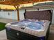 Relaxing hot tub with a pergola cover, perfect for outdoor entertaining at 7715 E Catalina Dr, Scottsdale, AZ 85251