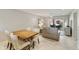 Cozy dining area with wood table and four chairs at 7732 E Desert Flower Ave, Mesa, AZ 85208