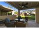 Patio furniture and ceiling fan at 7732 E Desert Flower Ave, Mesa, AZ 85208